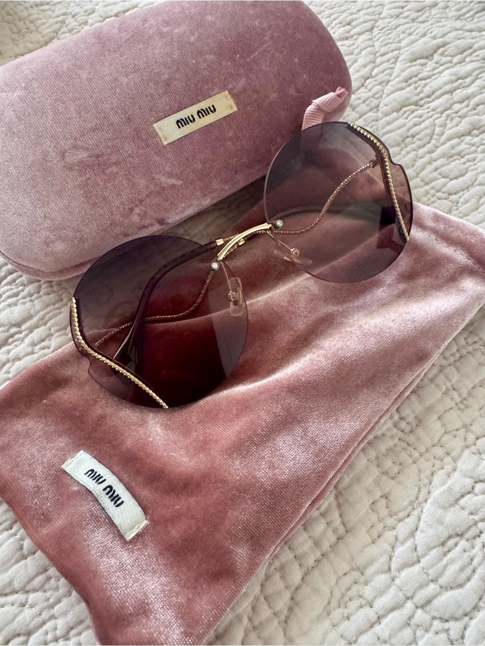 Miu Miu Rimless Sunglasses with Pink Gradient Lenses and Gold Accents